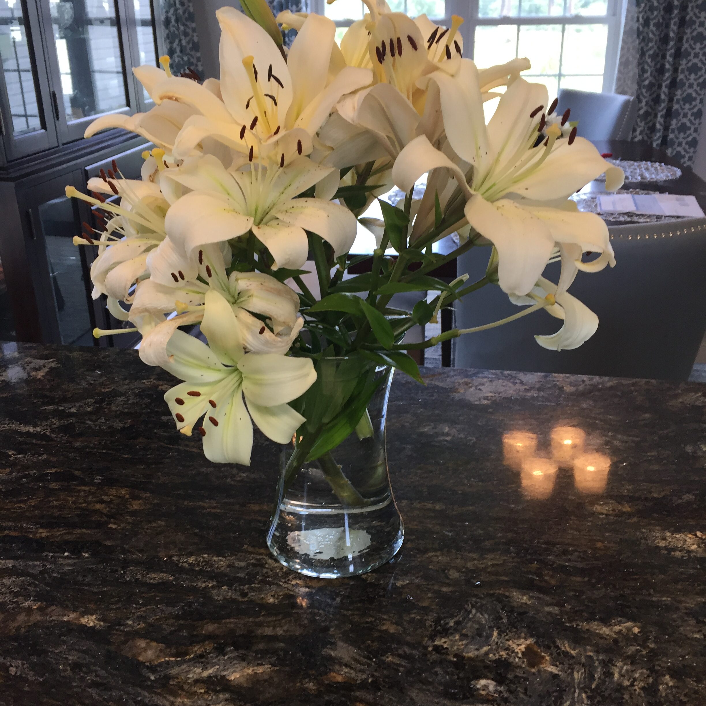 My white asiatic lilies in a vase